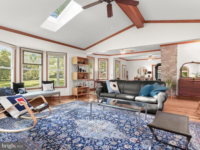 13310 Mockingbird Ln, Bowie, MD 20720 - living room with ceiling fan, wood finished floors, and a skylight