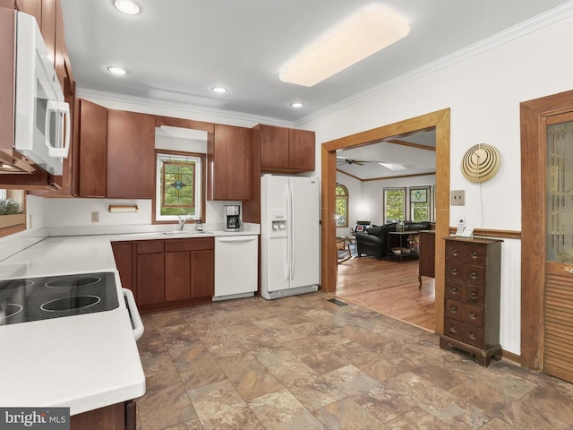 13310 Mockingbird Ln, Bowie, MD 20720 - kitchen with white appliances, ornamental molding, light countertops, light stone finish flooring, and a ceiling fan
