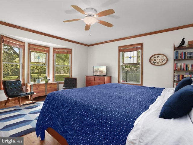 13310 Mockingbird Ln, Bowie, MD 20720 - bedroom featuring wood finished floors, multiple windows, ornamental molding, and ceiling fan