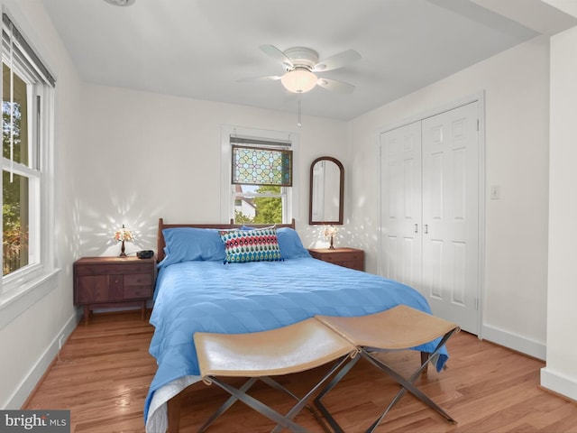 13310 Mockingbird Ln, Bowie, MD 20720 - bedroom with light wood-type flooring, a closet, and ceiling fan