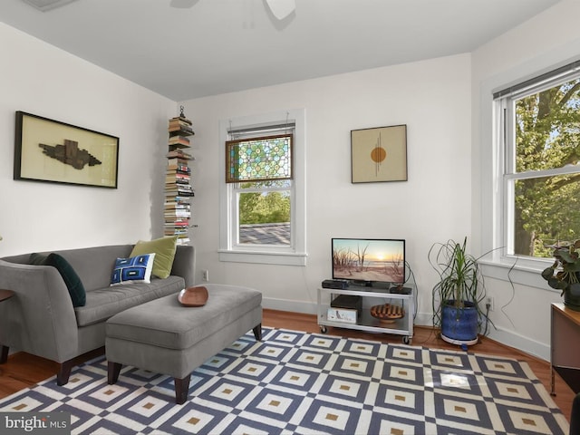 13310 Mockingbird Ln, Bowie, MD 20720 - living room with wood finished floors and a ceiling fan