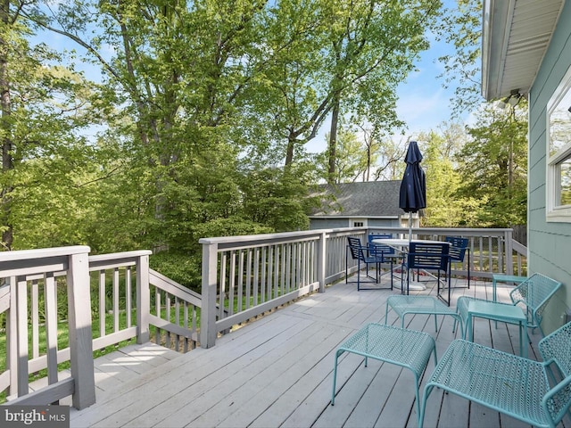 13310 Mockingbird Ln, Bowie, MD 20720 - wooden terrace with outdoor dining area