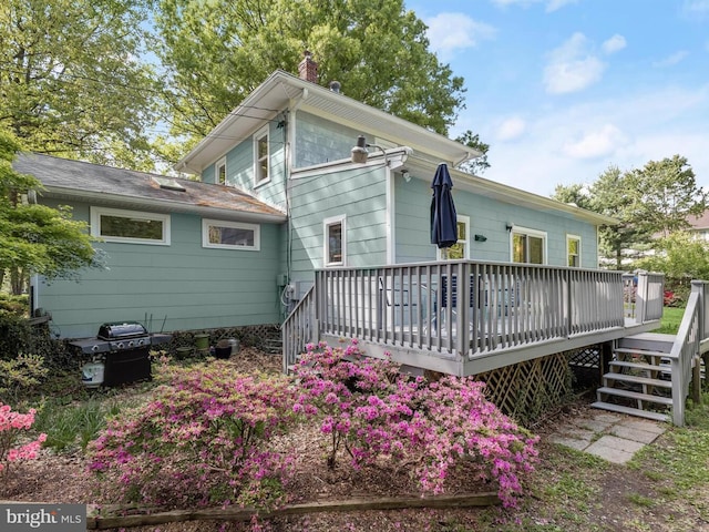 13310 Mockingbird Ln, Bowie, MD 20720 - rear view of house with a chimney and a deck