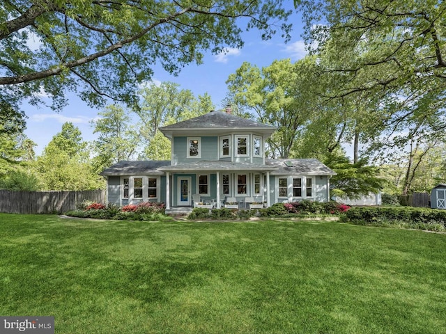 13310 Mockingbird Ln, Bowie, MD 20720 - view of front facade with a porch and a storage shed