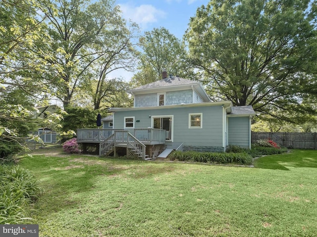 13310 Mockingbird Ln, Bowie, MD 20720 - rear view of house with a wooden deck and a chimney
