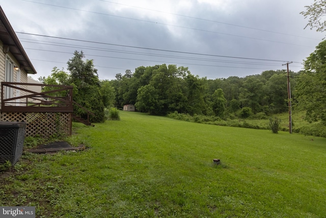 25 Pheasant Run, York Haven, PA 17370 - view of green lawn with a deck and a view of trees