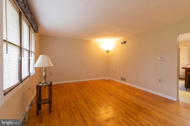 25 Pheasant Run, York Haven, PA 17370 - empty room featuring light wood-style flooring and a baseboard heating unit