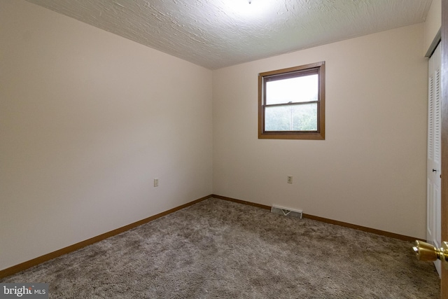 25 Pheasant Run, York Haven, PA 17370 - unfurnished bedroom featuring carpet flooring, a closet, and a textured ceiling