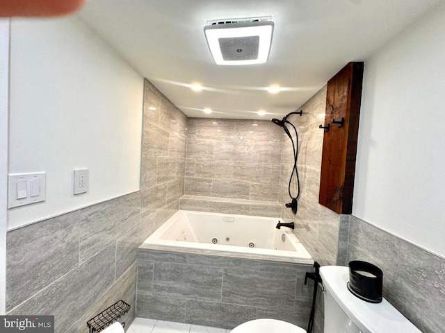 20822 Valley Forge Cir Unit 822, King Of Prussia, PA 19406 - bathroom featuring tile walls, a combined bath / shower with jetted tub, and tile patterned flooring