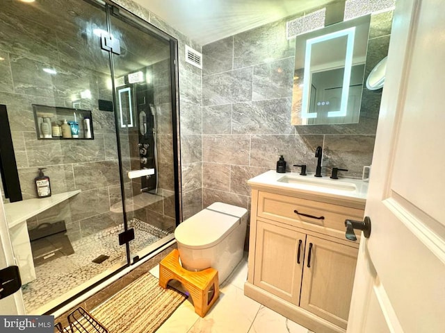 20822 Valley Forge Cir Unit 822, King Of Prussia, PA 19406 - bathroom with marble finish floors, vanity, tile walls, and a shower stall
