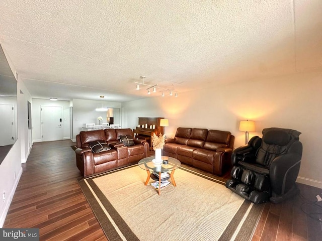 20822 Valley Forge Cir Unit 822, King Of Prussia, PA 19406 - living area featuring dark wood-type flooring and a textured ceiling