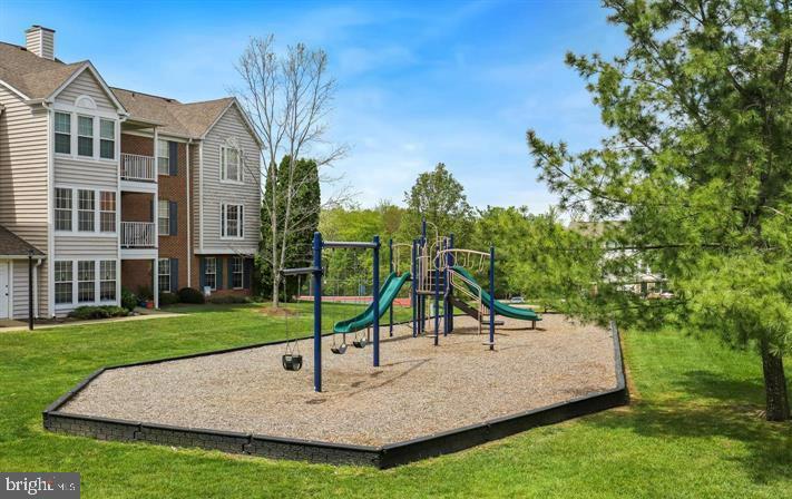 3597 Sherbrooke Cir, Woodbridge, VA 22192 - community jungle gym featuring a lawn