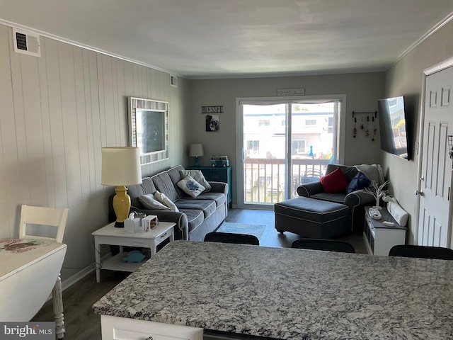 708 Bradley Rd Unit B, Ocean City, MD 21842 - living area with ornamental molding and dark wood-type flooring