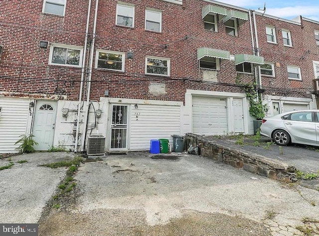 747 Bennington Rd, Folcroft, PA 19032 - back of property featuring brick siding and driveway