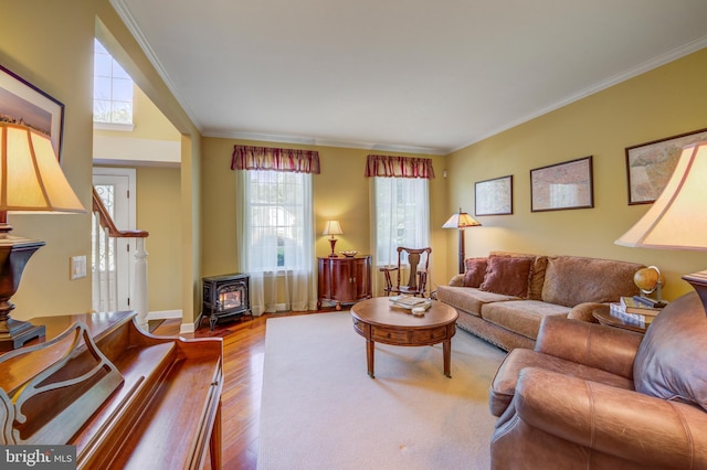 18 Knottingham Dr, Voorhees, NJ 08043 - living room featuring a wood stove, wood finished floors, and ornamental molding