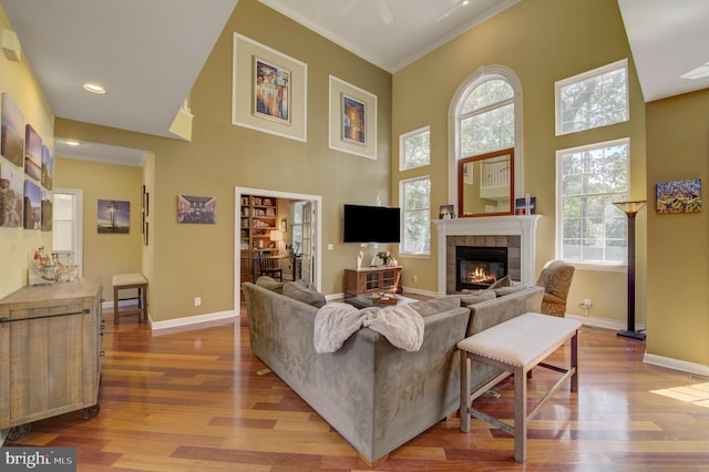 18 Knottingham Dr, Voorhees, NJ 08043 - living room with wood finished floors, a fireplace, recessed lighting, ornamental molding, and a towering ceiling