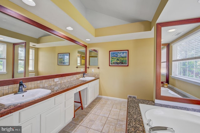 18 Knottingham Dr, Voorhees, NJ 08043 - bathroom with double vanity, backsplash, a bath, and recessed lighting