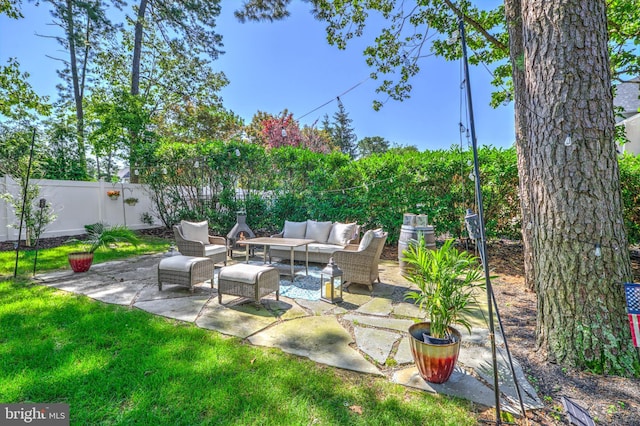 18 Knottingham Dr, Voorhees, NJ 08043 - fenced backyard with an outdoor hangout area and a patio area