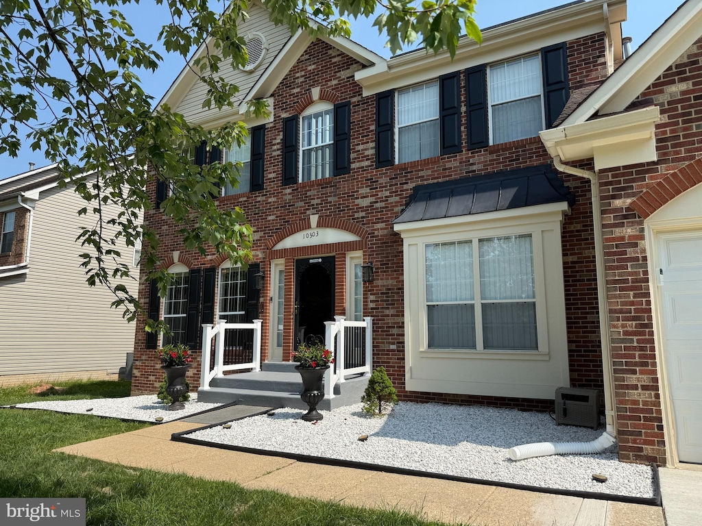 10303 Halton Ter, Lanham, MD 20706 - view of front of property with brick siding and a standing seam roof