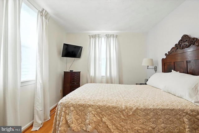8141 Gray Haven Rd, Baltimore, MD 21222 - bedroom featuring light wood-style flooring and baseboards