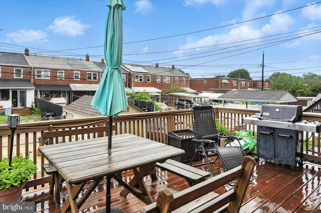 8141 Gray Haven Rd, Baltimore, MD 21222 - wooden deck featuring grilling area and outdoor dining area