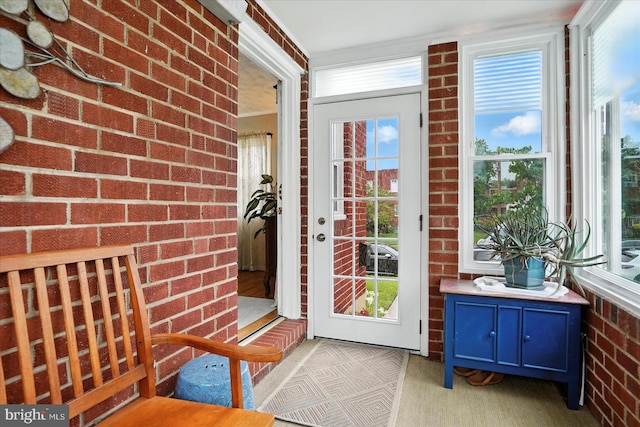 8141 Gray Haven Rd, Baltimore, MD 21222 - entryway featuring brick wall and healthy amount of natural light