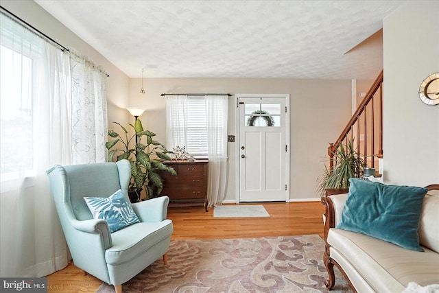 8141 Gray Haven Rd, Baltimore, MD 21222 - foyer entrance with stairway and wood finished floors