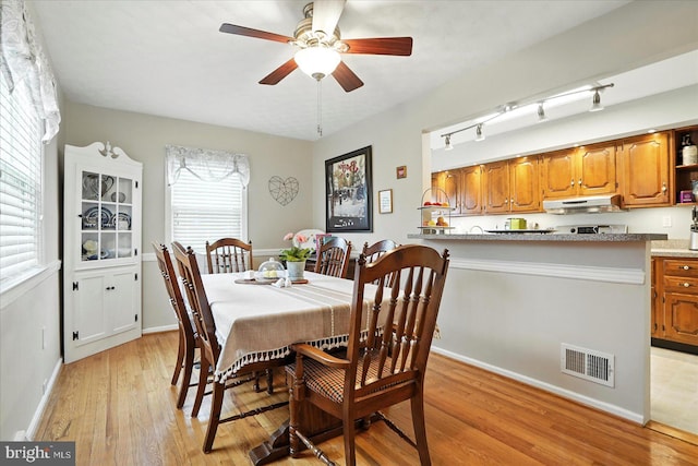 8141 Gray Haven Rd, Baltimore, MD 21222 - dining area featuring light wood finished floors and ceiling fan