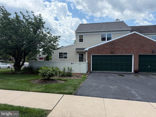 127 Winding Hill Dr, Lancaster, PA 17601 - view of front of house with driveway, a garage, and brick siding