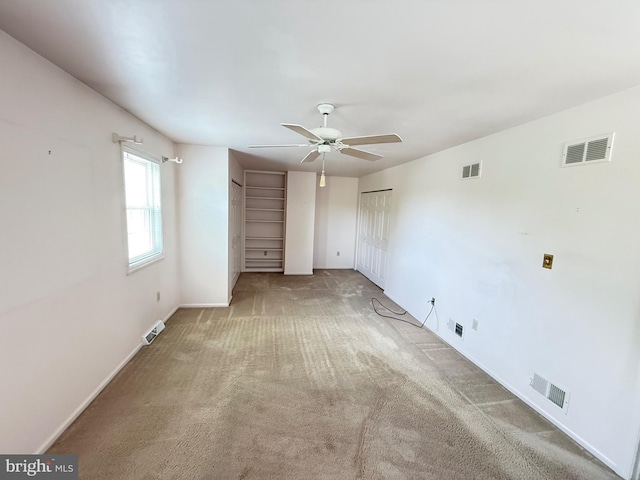 127 Winding Hill Dr, Lancaster, PA 17601 - unfurnished bedroom with light colored carpet, two closets, and a ceiling fan