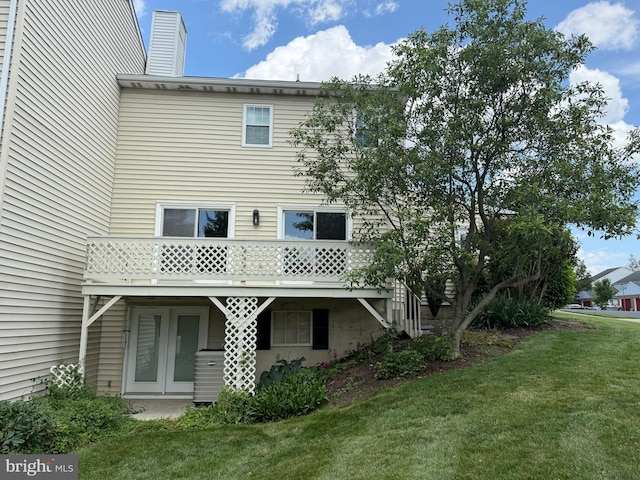 127 Winding Hill Dr, Lancaster, PA 17601 - rear view of property featuring a yard and a chimney