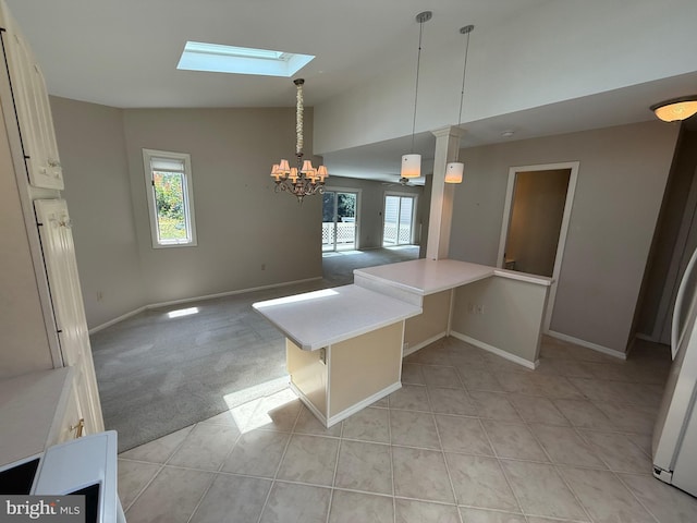 127 Winding Hill Dr, Lancaster, PA 17601 - unfurnished dining area featuring a skylight, a chandelier, light tile patterned floors, and high vaulted ceiling