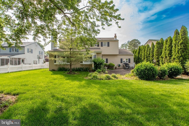 1018 Hilltop Rd, Warminster, PA 18974 - rear view of house featuring a chimney and a patio