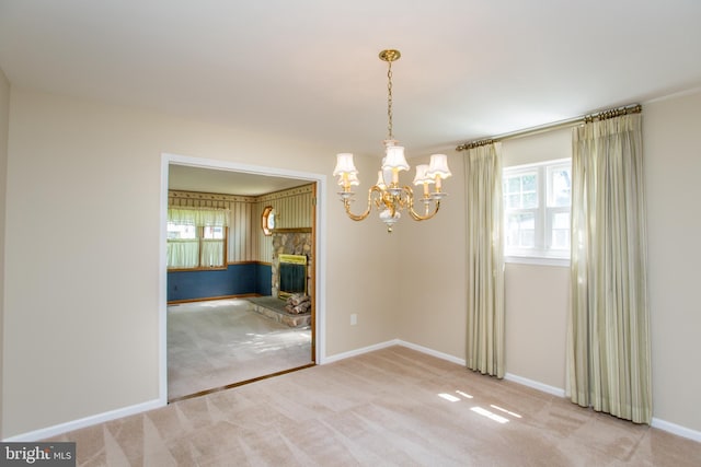 1018 Hilltop Rd, Warminster, PA 18974 - unfurnished dining area with plenty of natural light, a chandelier, and carpet