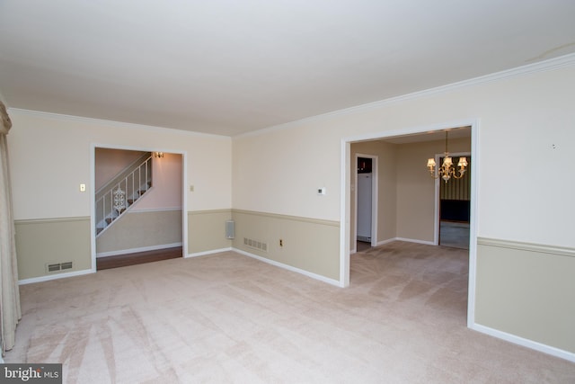 1018 Hilltop Rd, Warminster, PA 18974 - unfurnished room featuring stairs, a chandelier, ornamental molding, and carpet flooring