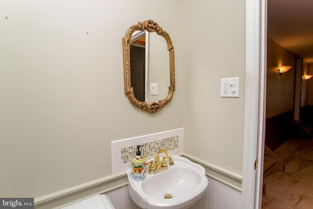 1018 Hilltop Rd, Warminster, PA 18974 - bathroom featuring a sink and decorative backsplash
