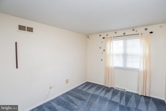 1018 Hilltop Rd, Warminster, PA 18974 - spare room with dark colored carpet and baseboards