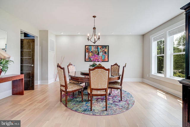 9908 Blake Ln, Oakton, VA 22124 - dining room with light wood-type flooring, recessed lighting, and a chandelier