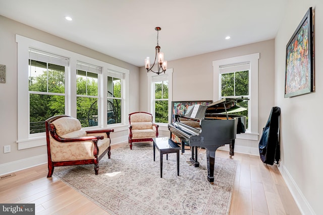 9908 Blake Ln, Oakton, VA 22124 - sitting room featuring wood finished floors, recessed lighting, and a chandelier