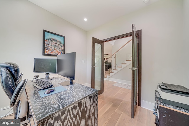 9908 Blake Ln, Oakton, VA 22124 - home office with light wood-style flooring and recessed lighting