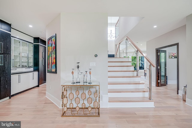 9908 Blake Ln, Oakton, VA 22124 - staircase featuring wood finished floors and recessed lighting