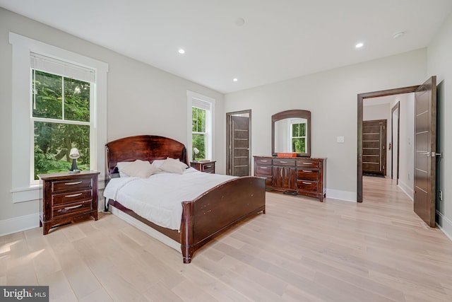 9908 Blake Ln, Oakton, VA 22124 - bedroom with light wood-type flooring and recessed lighting