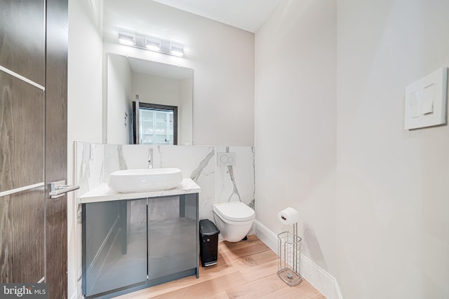 9908 Blake Ln, Oakton, VA 22124 - bathroom featuring vanity and wood finished floors