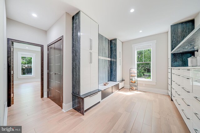9908 Blake Ln, Oakton, VA 22124 - mudroom with light wood-style flooring and recessed lighting