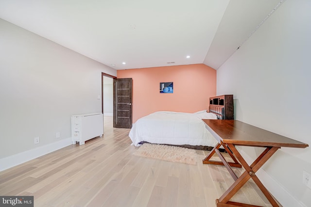 9908 Blake Ln, Oakton, VA 22124 - bedroom featuring light wood-style floors, recessed lighting, and lofted ceiling