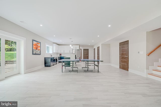 9908 Blake Ln, Oakton, VA 22124 - playroom featuring plenty of natural light, recessed lighting, and light wood-type flooring