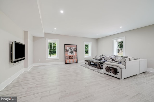 9908 Blake Ln, Oakton, VA 22124 - living area featuring healthy amount of natural light, light wood-type flooring, and recessed lighting
