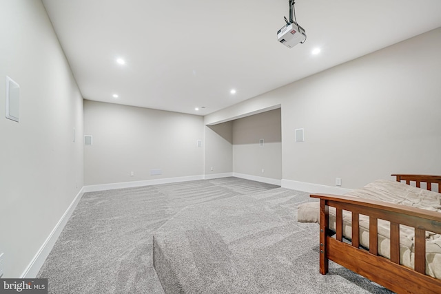 9908 Blake Ln, Oakton, VA 22124 - finished below grade area featuring recessed lighting and carpet floors