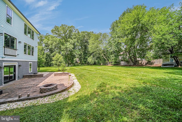 9908 Blake Ln, Oakton, VA 22124 - view of green lawn with a fire pit and a patio
