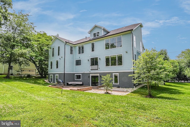 9908 Blake Ln, Oakton, VA 22124 - back of house featuring a yard and a patio area